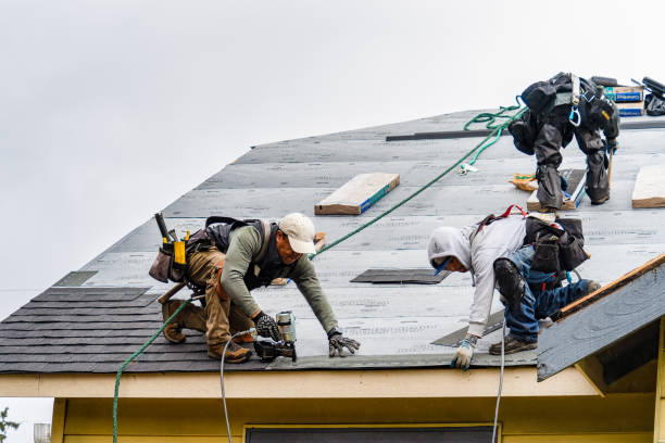 Professional Roofing technician working in Batson, TX